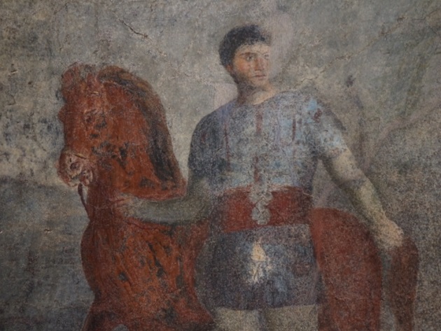 Tomba 19, Affresco di giovane vestito da auriga - Eppur si espone Tomba 19, Affresco di giovane vestito da auriga - Eppur si espone